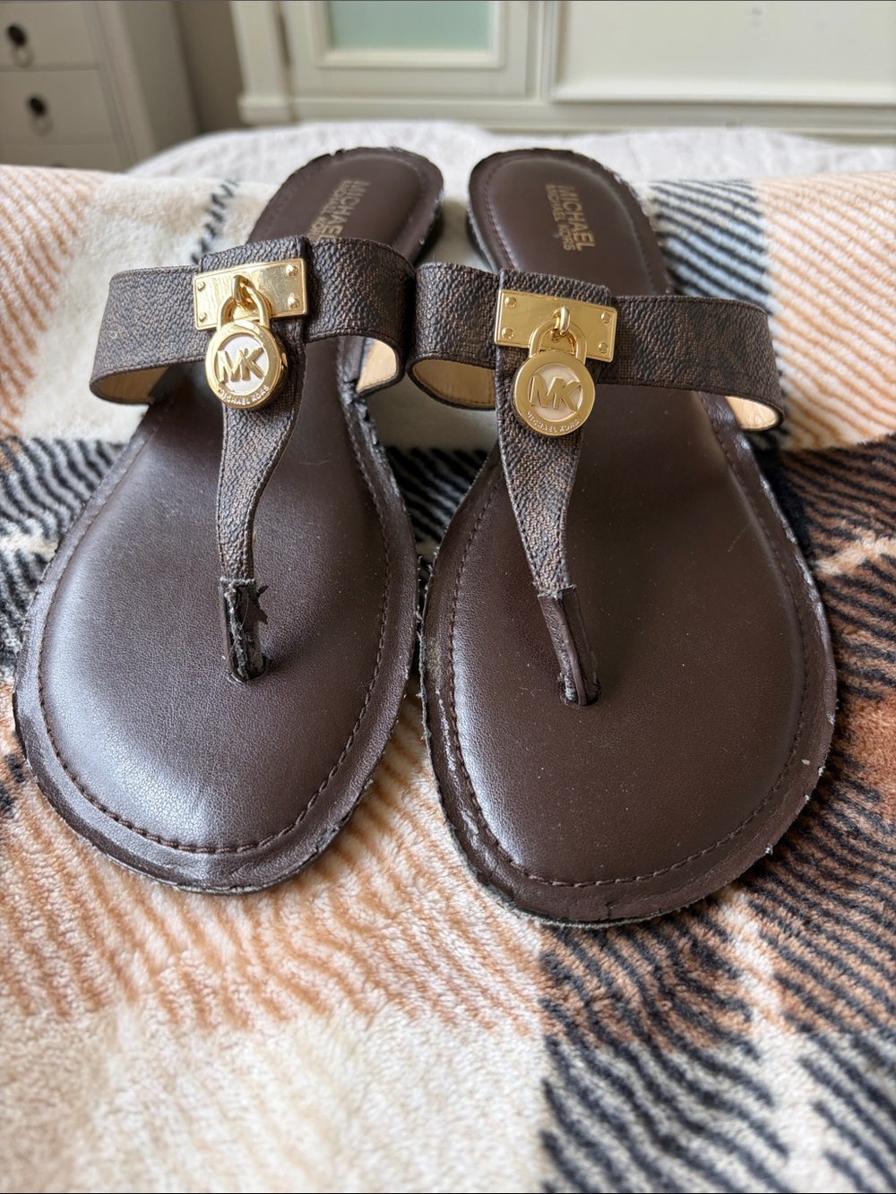 MICHAEL Michael Kors Brown Leather Thong Sandals with Gold Logo Charm
